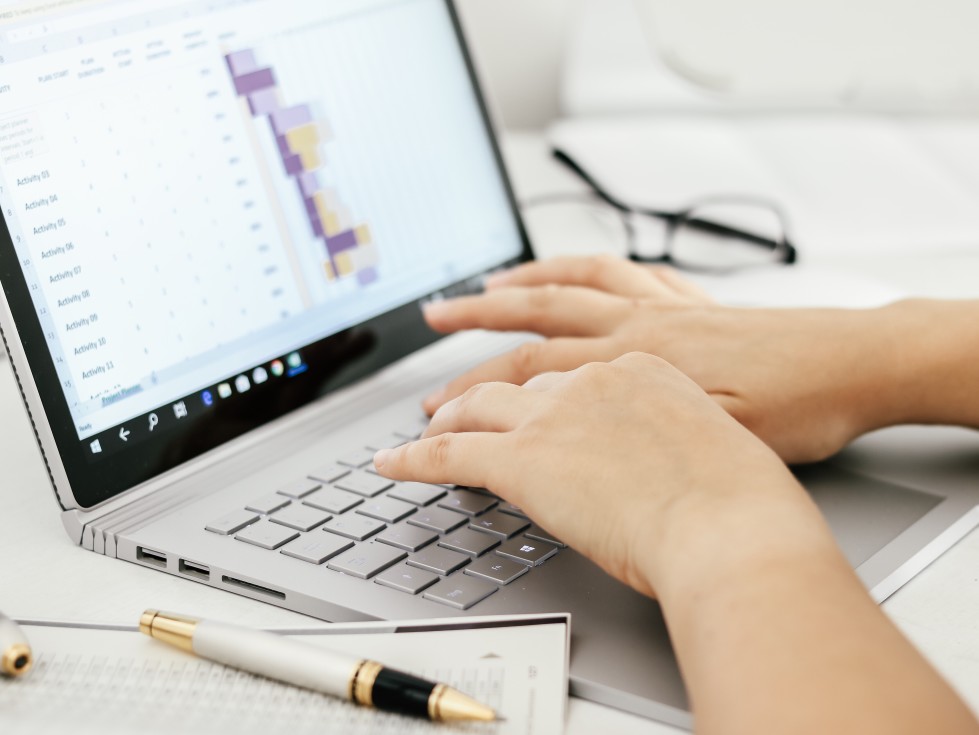 Hands Typing On Keyboard Preparing An Excel Table With Financial Data T20 7L4px4