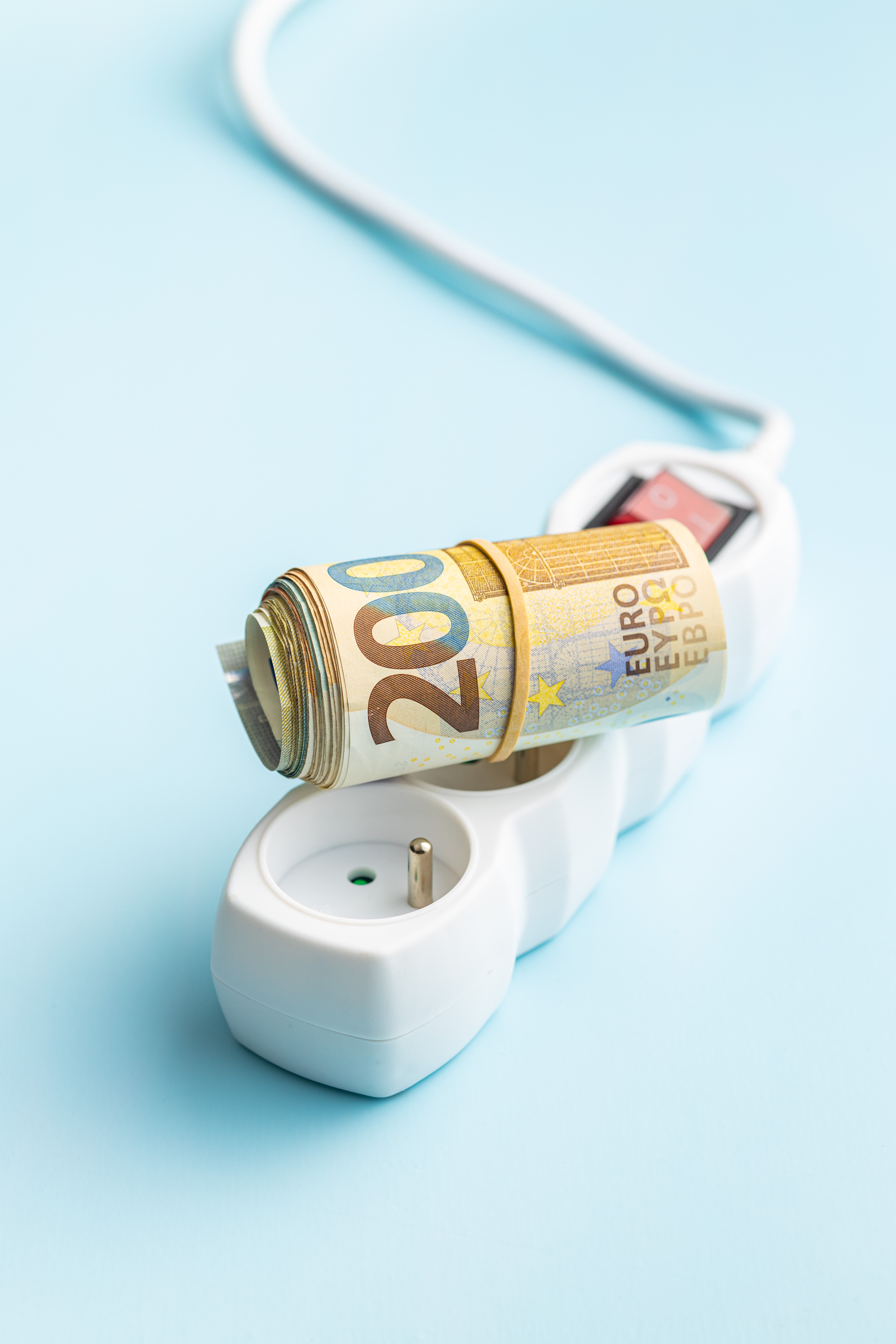 Electric Socket And Euro Money On Blue Background 2025 03 13 12 34 10 Utc