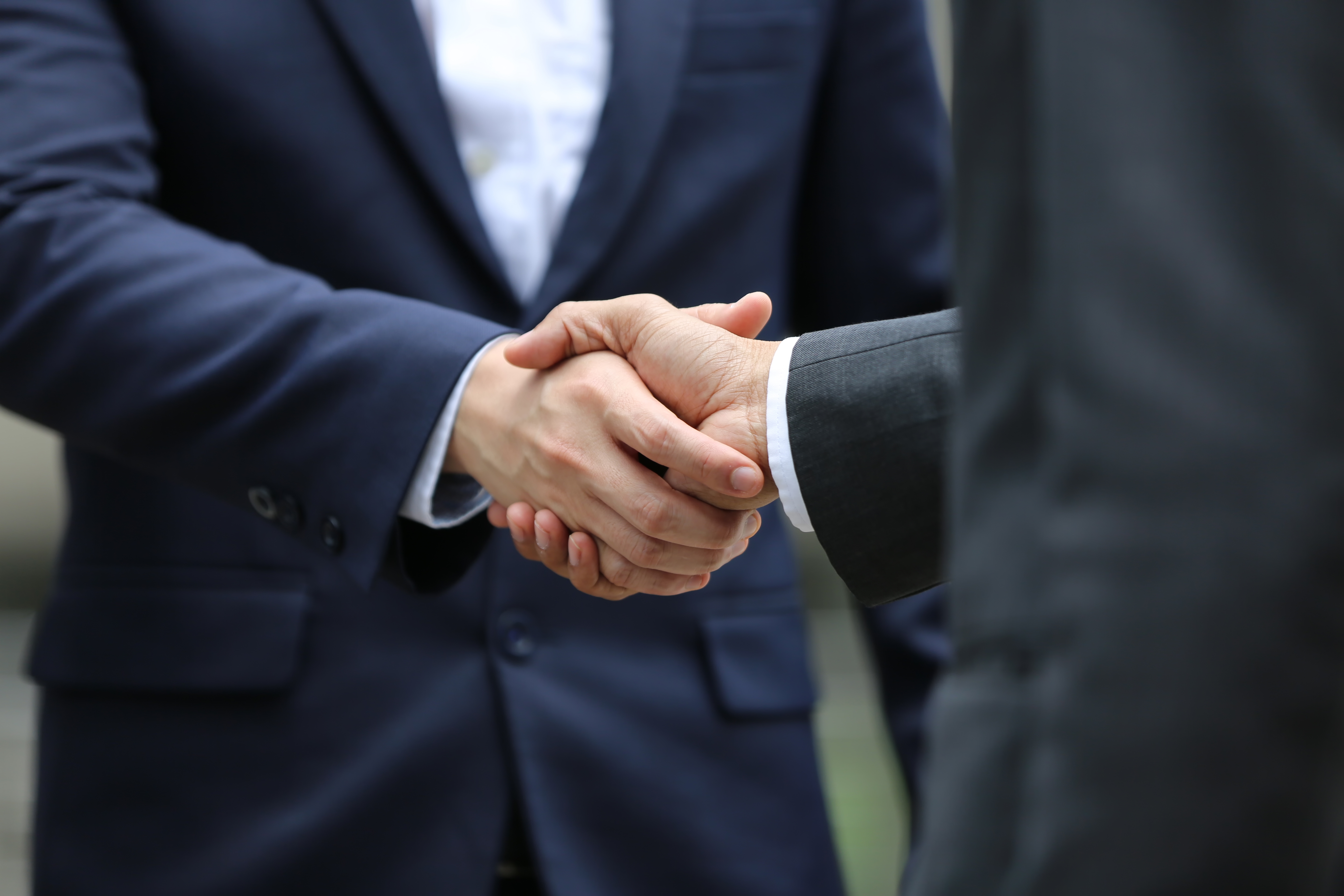 Handshake Of Two Men In Business Suits Partnership Deal Teamwork Team Successful Male Cooperation T20 8Dgyab